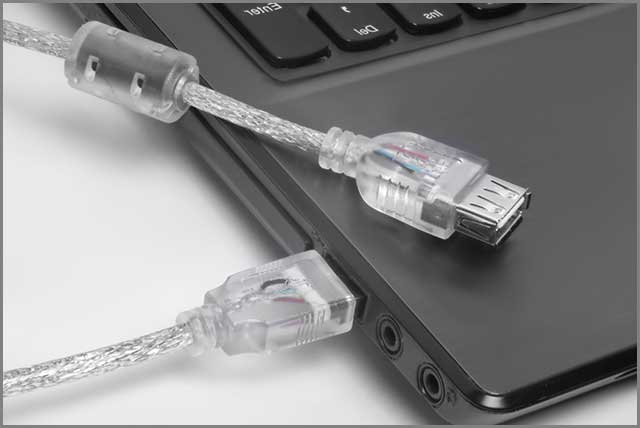 An image of USB cable extension transparent and protected plugged