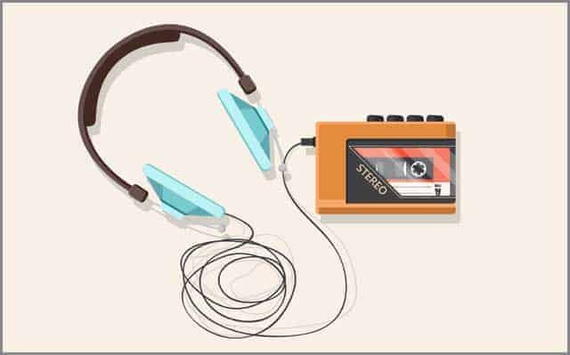 Headphones, player and retro cassette.