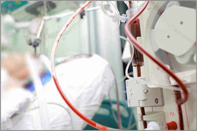 Patient on cardiopulmonary bypass device in the intensive care unit