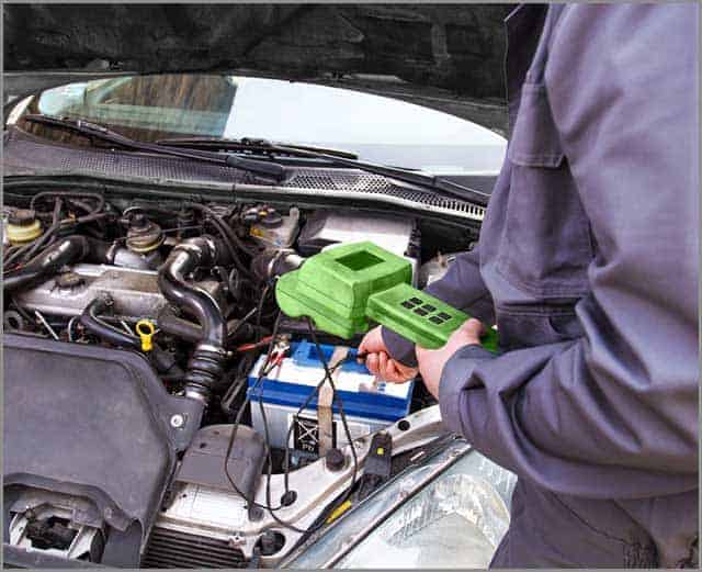 Automobile Wire Harness--Mechanic Checking the Electrical System in a Car