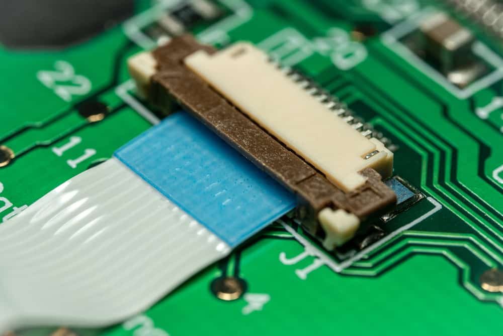 Macro,Photo,Of,A,Flat,Ribbon,Cable,And,Connector,On