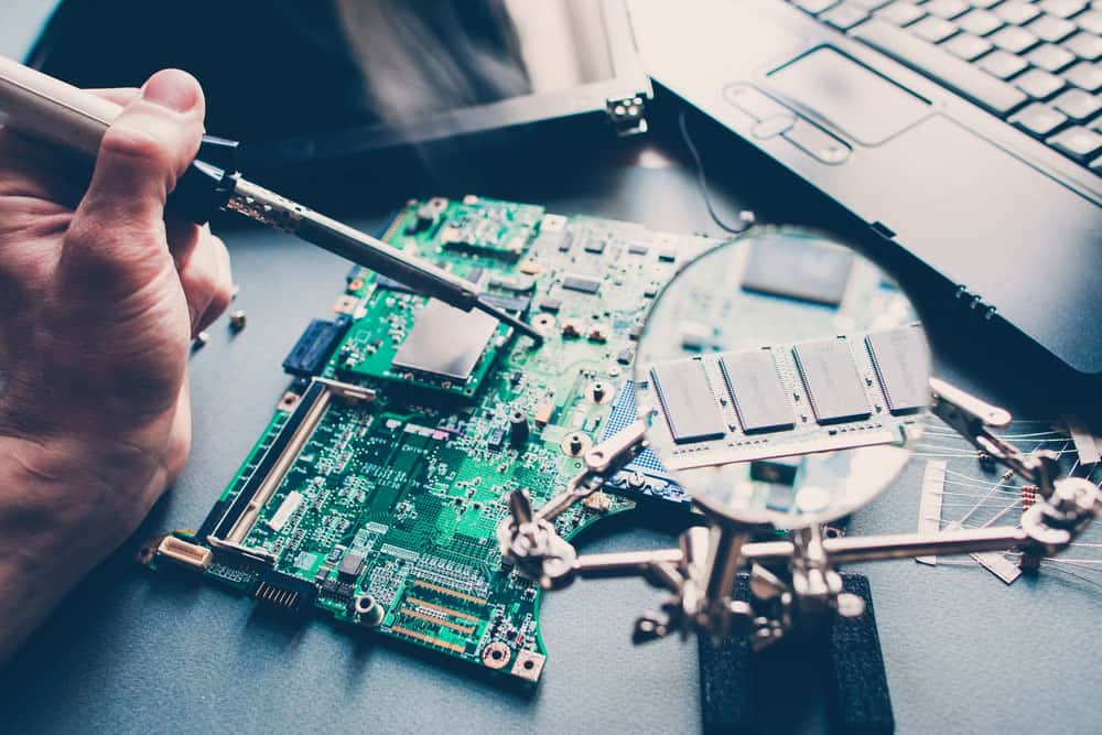 Pcb layout repairing technician soldering laptop