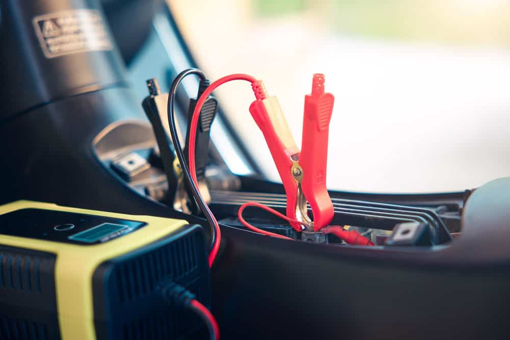 Jump start a car with portable jump starters