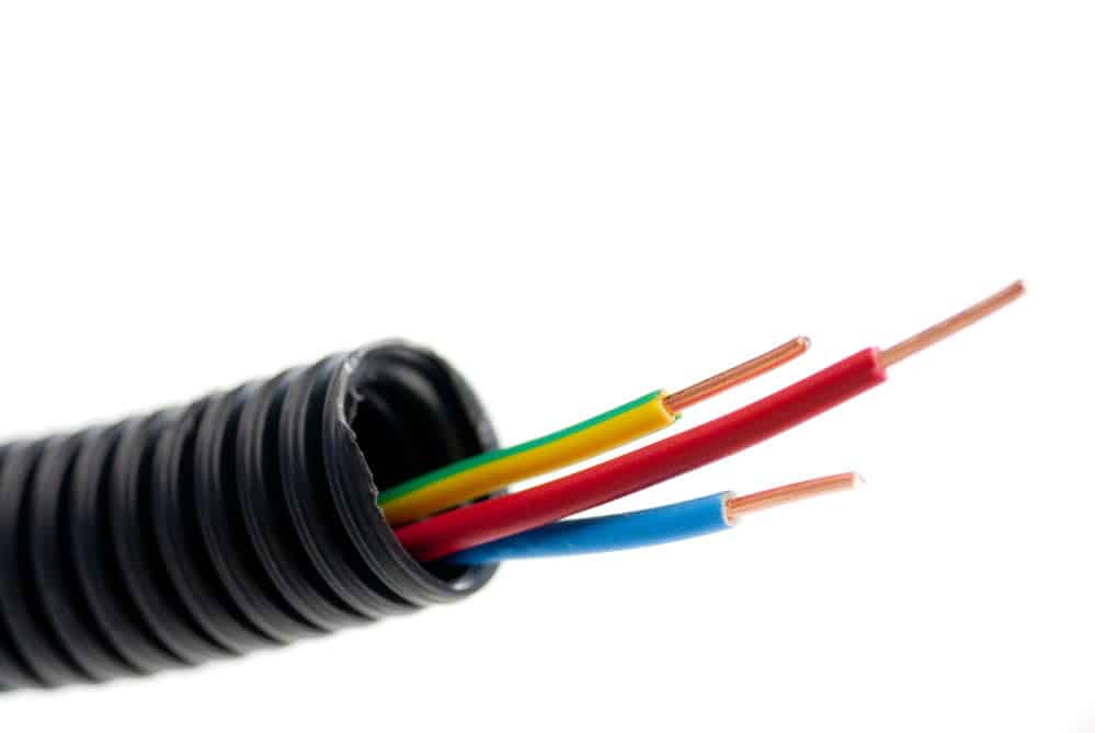 Heavy equipment wire harness:
Electrical wires inside the tube