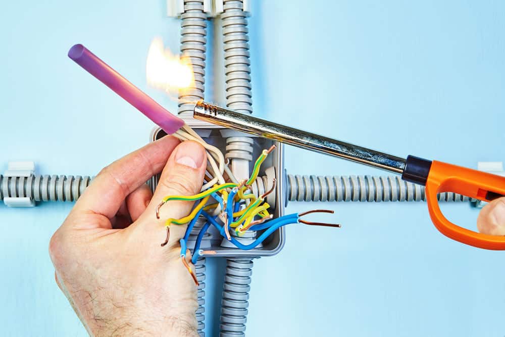 Heavy equipment wire harness:
Convoluted tubing over heat shrink tubing