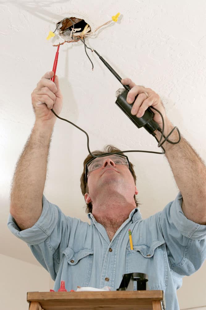 electrician testing voltage