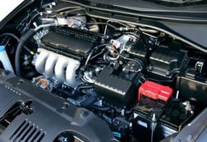 Close-up view of a car engine with electrical cables